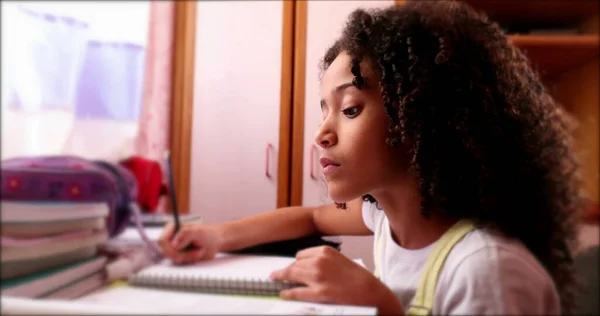 Little School Girl Studying Home Writing Notes Black Mixed Race — Φωτογραφία Αρχείου