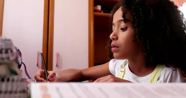 Mixed Race Girl Writing Notes Doing Homework Home Little Girl — Foto Stock