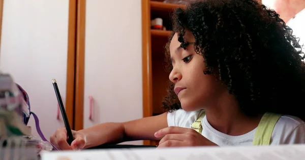 Mixed Race Girl Writing Notes Doing Homework Home Little Girl — Φωτογραφία Αρχείου