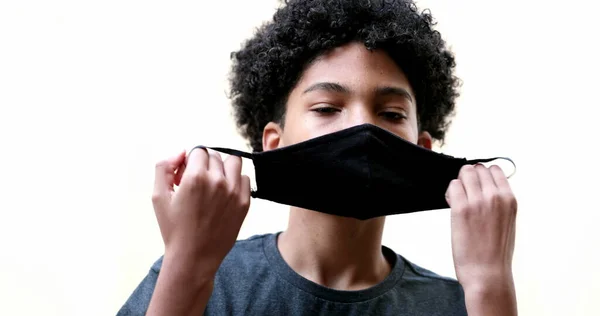 Young Boy Removing Covid Face Mask Feeling Relief — Φωτογραφία Αρχείου