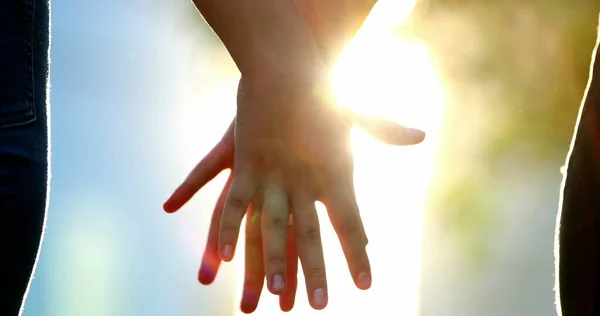 Close Hands Joining Together Sunlight Flare Background — Foto Stock