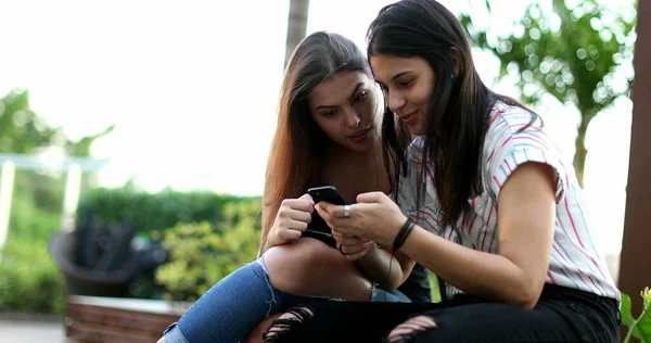 Girlfriends Using Smartphone Device Women Checking Cellphone —  Fotos de Stock