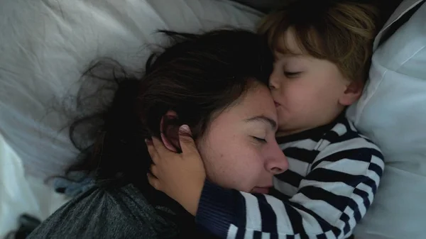 Toddler Hugging Mother Lying Bed Together Family Love Affection — Stok fotoğraf