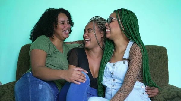 Joyful Three Black Latina Women Laughing Smiling Girlfriends Embrace Hanging — Zdjęcie stockowe