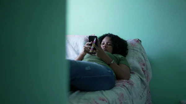 One Young African Woman Using Phone Lying Bed Brazilian Black — Stockfoto