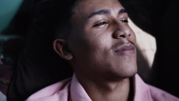One Confident Hispanic Man Smiling Lying Sofa — Stock videók