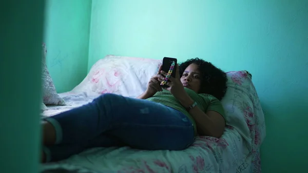 Candid Girl Looking Cellphone Device Lying Bed Home — Stockfoto