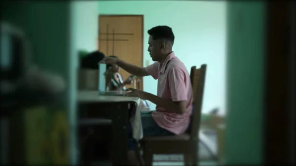 One Young Hispanic Man Sitting Opening Laptop Computer Home — Zdjęcie stockowe