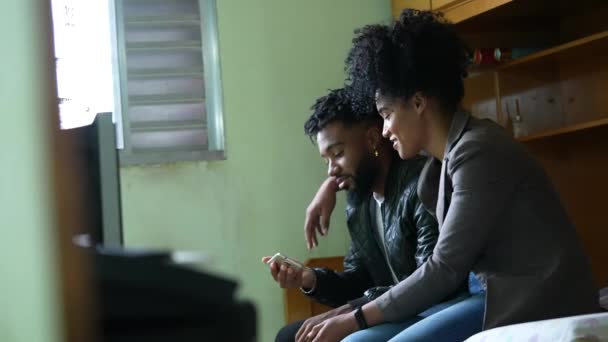 Black Couple Looking Smartphone Device Together Bedroom — ストック動画