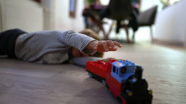 Child Playing Toy Hardwood Floor Kid Plays Home — Stock Photo, Image