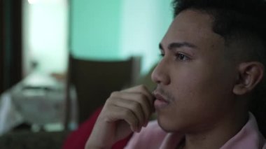 A young thoughtful South American person portrait face thinking