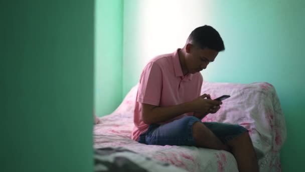 Candid Young Man Reading Message Phone Bringing Closer Face — Vídeos de Stock