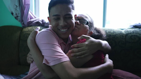 Grandson Embracing Grandmother Home Two Hispanic Family Members Hugging Each — Fotografia de Stock