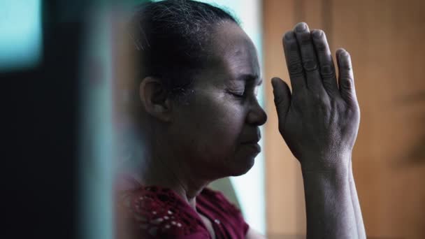 Contemplative South American Senior Woman Praying One Spiritual Older Lady — Stock video