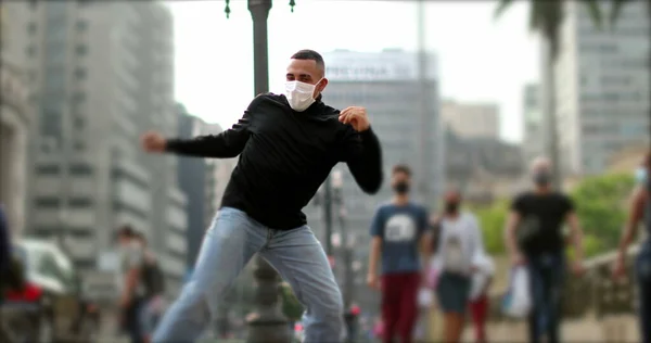 Person Dancing Street Wearing Covid Face Mask Downtown City — Stok fotoğraf
