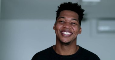 Charismatic young African black man smiling
