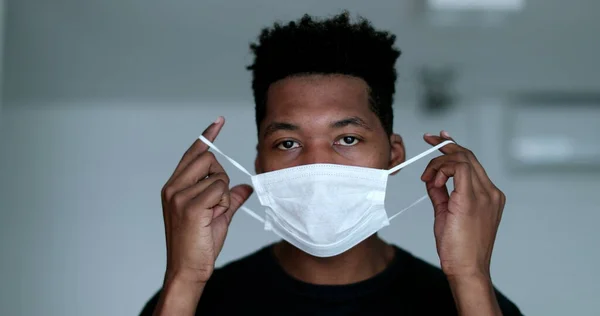 Black Man Removing Surgical Face Mask Feeling Relief African Person — 图库照片