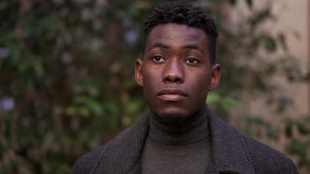 Serious Young Black Man Standing Outdoors Stoic Handsome African Person — Video