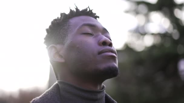 Contemplative Black Man Looking Sky Hope Faith Closing Opening Eyes — Video Stock