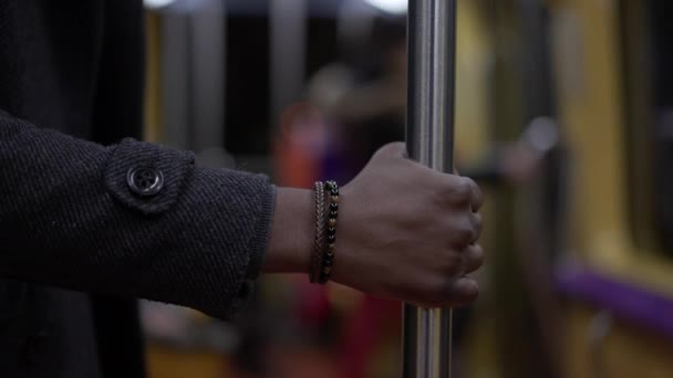 Close Hand Holding Metro Subway Bar Handrail — Stockvideo