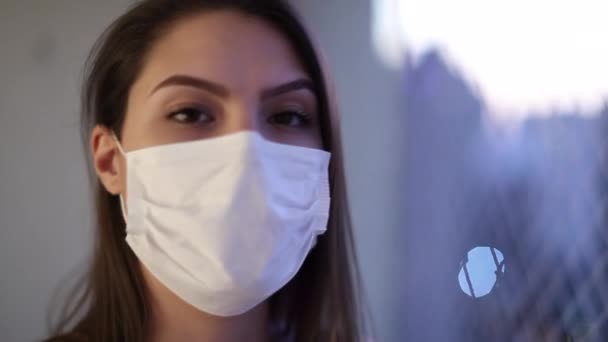 Young Woman Wearing Surgical Mask Prevention Virus Indoors — Stock video