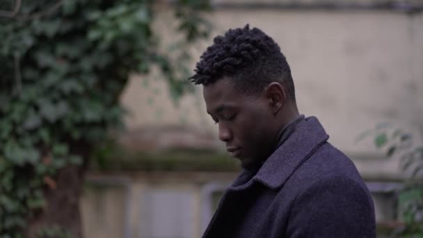 Pensive Young Black Man Meditating Outdoors African Person Face Close — Vídeo de Stock