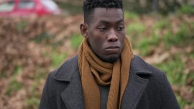 Doubtful young black man thinking about life