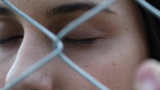 Woman Fence Imprisoned Concept Girl Opening Eyes Bars — Stockvideo