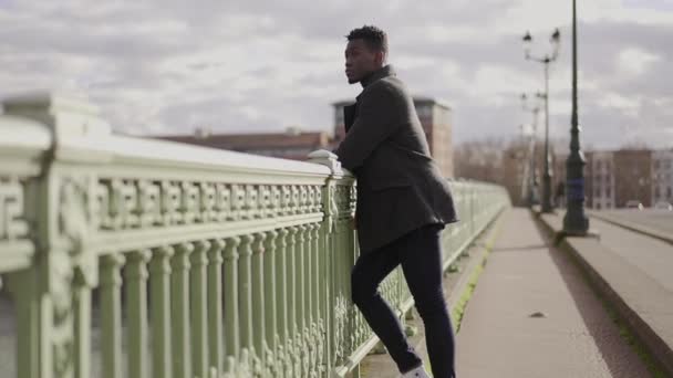 Pensive Black Man Thinking Life Top City Bridge Elegant African — Stockvideo