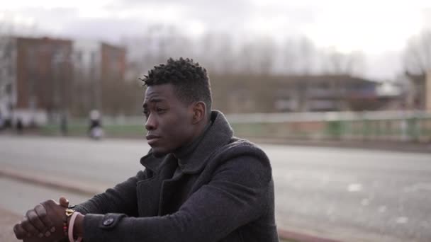 Pensive Worried Black African Man Feeling Anxious Concerned Sitting Sidewalk — Video