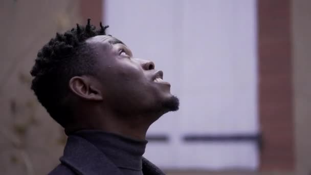 Young African Man Face Close Looking Hope Faith — Stockvideo