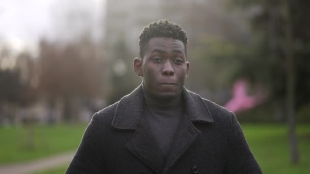 Black Man Standing Cold Wearing Winter Coat Freezing — Vídeos de Stock