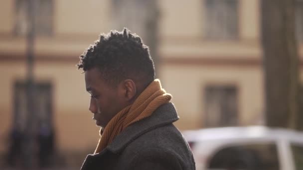 Pensive Thoughtful Black African Man Walking Winter Season — Stockvideo