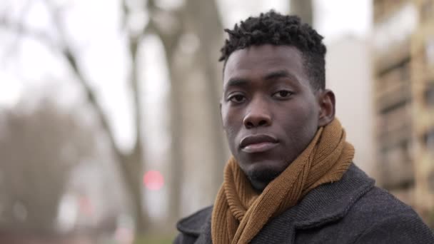 Confident African Black Man Standing Winter Season Portrait Staring Camera — стоковое видео