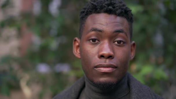 Confident Young Black Man Standing Staring Camera Portrait Face Close — Video