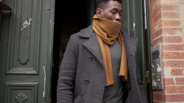 Young Black Man Stepping Winter Season African Person Leaving House — Stockvideo