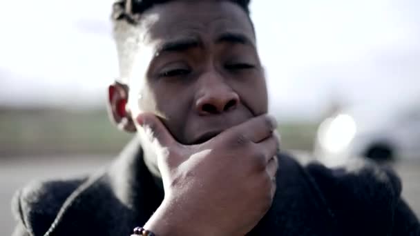 Preoccupied Young Black Man Anxious Person Sitting Ground City Sidewalk — Stock video