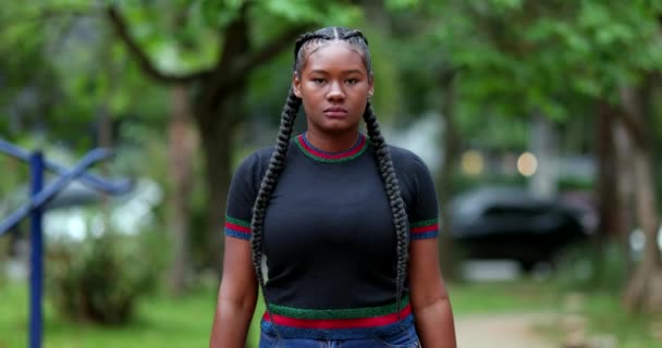 Confident Young Black Woman Raising Fist Walking Camera — Stock videók