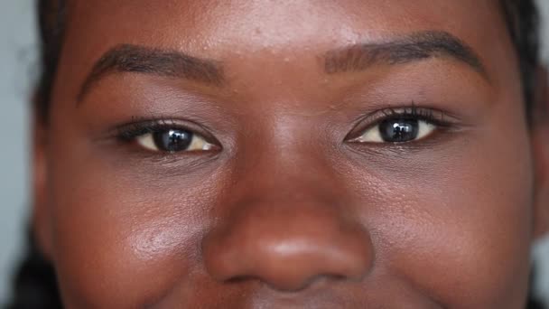 African Woman Smiling Camera Close Black Girl Eyes Staring Camera — стоковое видео