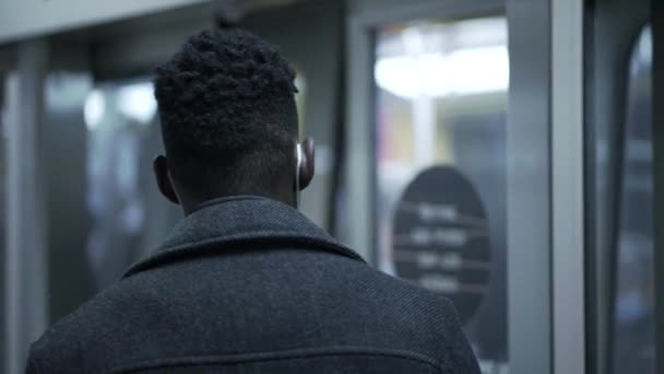 African Man Entering Subway Wagon Wearing Covid Face Mask Underground — Vídeos de Stock