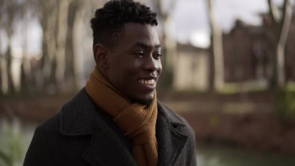 Happy Black Man Walking Nature Winter Season Smiling Feeling Carefree — Stockvideo