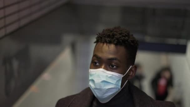 Black Man Wearing Covid Face Mask While Commuting Underground — Stockvideo