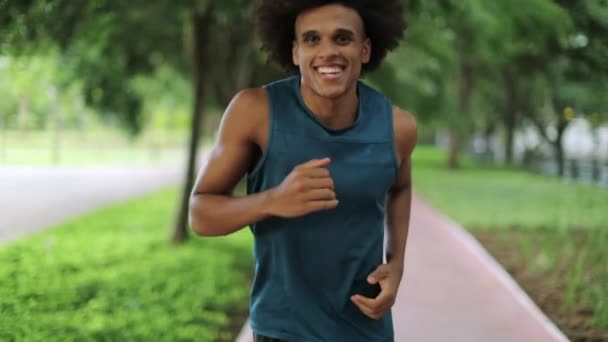 Confident Young Black Man Running Park Smiling — Video