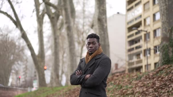 Young Black Man Standing Wearing Coat Scarf Looking Camera Portrait — Vídeos de Stock