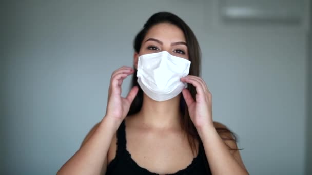 Young Woman Removing Surgical Pandemic Mask Feeling Relief — Vídeo de stock