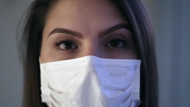 Young Woman Face Wearing Virus Mask Girl Staring Camera Surgical — Stockvideo