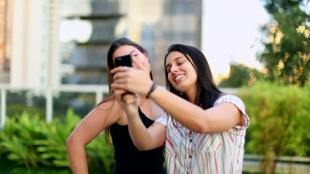 Two Young Women Taking Selfie Millennial Girls Holding Smartphone Taking — Stockvideo