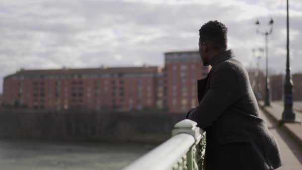 Thoughtful Black African Man Thinking Life Top Bridge — Vídeos de Stock