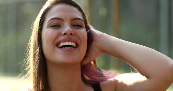 Millennial Girl Smiling Camera Park Young Woman Portrait Real Life — Vídeo de stock