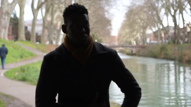 Silhouette Young Black Man Walking Bridge Cold Winter Season — Video Stock